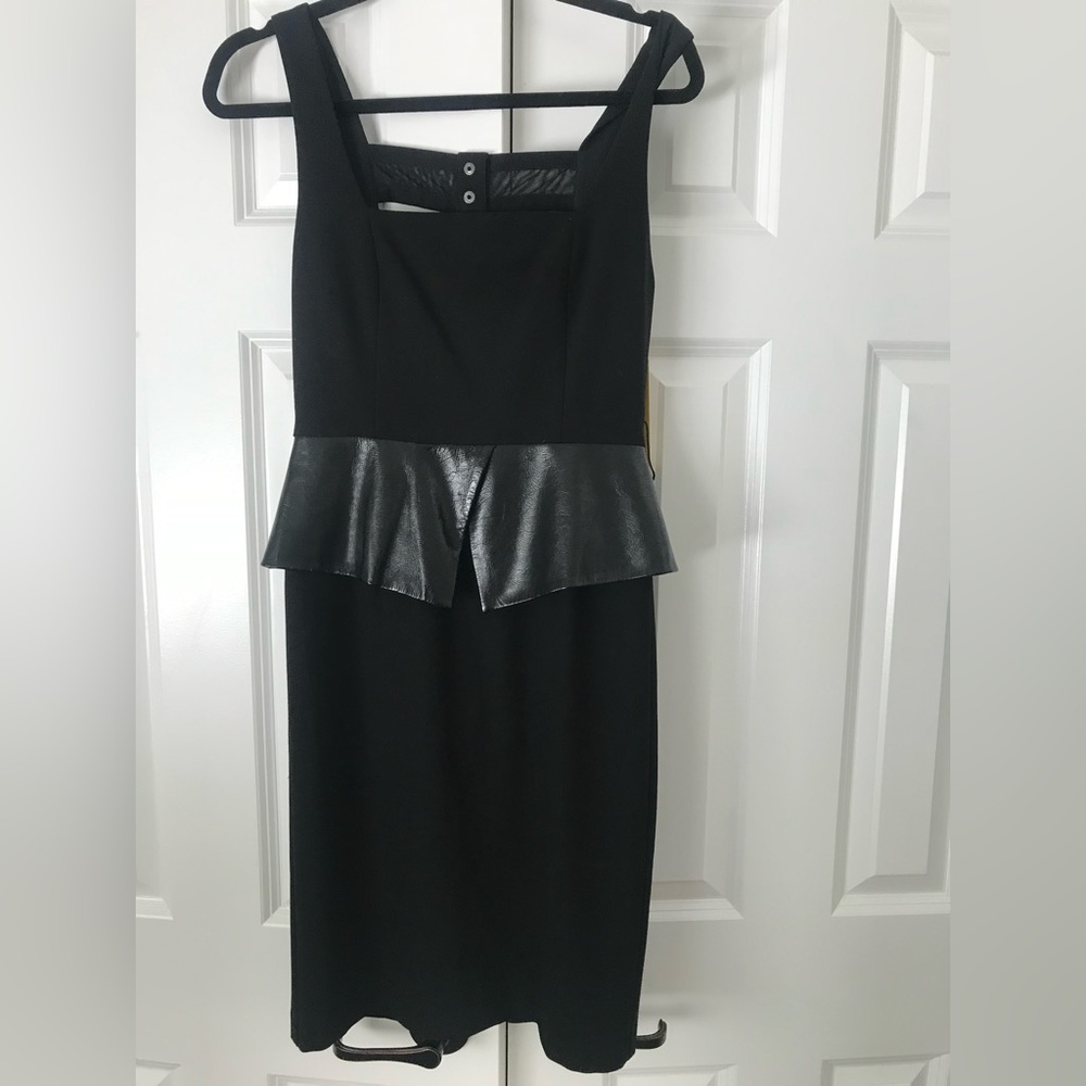 ALICE and OLIVIA leather peplum dress. Brand new with tags. Size 8.